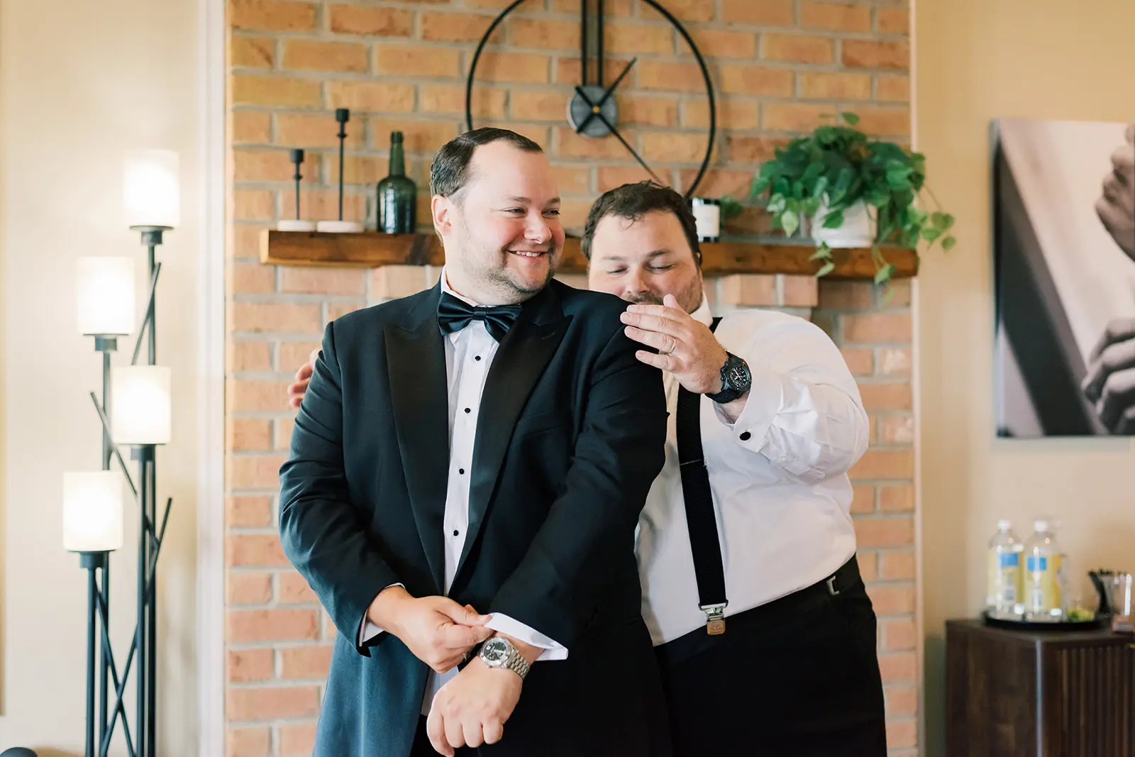 groomsmen getting ready in the house groomsmen getting ready in the house